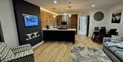Image looking from the living area onto the kitchen diner area
