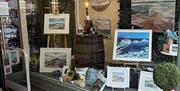 Front window of Midtown Makers shop