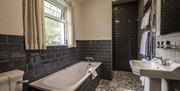 interior of bathroom in Superking room at Brown Trout Country Inn