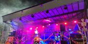Image shows a stage set up with spooky Halloween characters