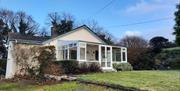 A 140 year old cottage restored in the 1990s in a traditional style,  just a 5 minute drive from both Royal Hillsborough and Dromore , it has fast roa