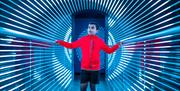 A mesmerising exhibition at W5 with a young boy walking through an optical illusion