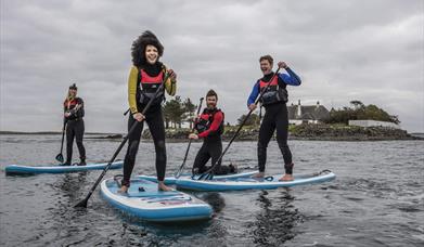 Group enjoys Stand Up Paddleboarding in Strangford Lough