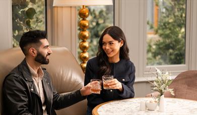 couple in the River Room enjoying Christmas Day