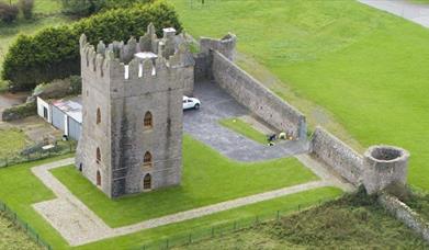 Photo of birds eye view of Kirkistown Castle surrounded by grassland