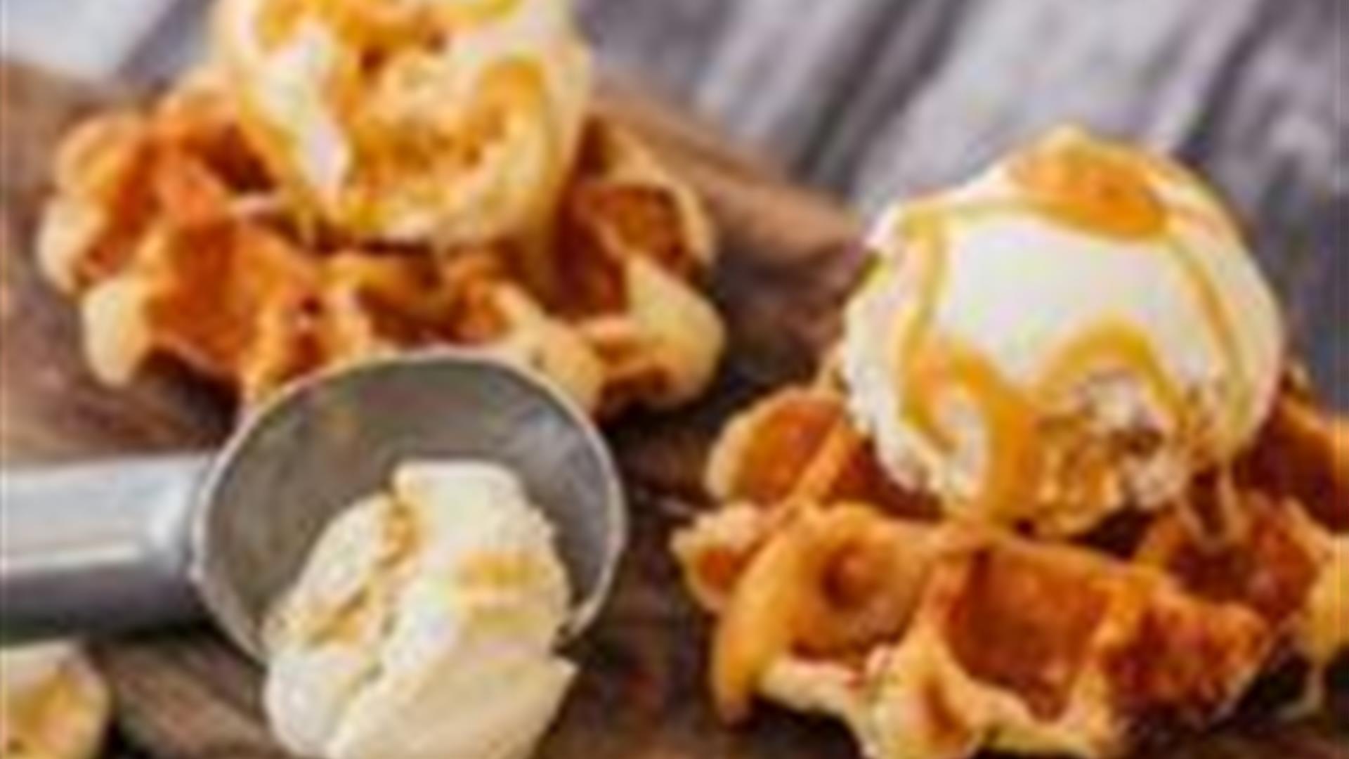 Ice cream scoop on waffles