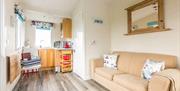 Kitchen Space with sofa in Seal Cabin located on Strangford Lough
