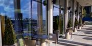 Dine outside on the riverside terrace at Novelli at City Quays