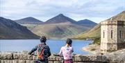 2 Cyclists enjoying the view of Silent Valley