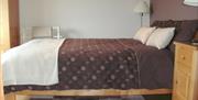 double bed with bedside table