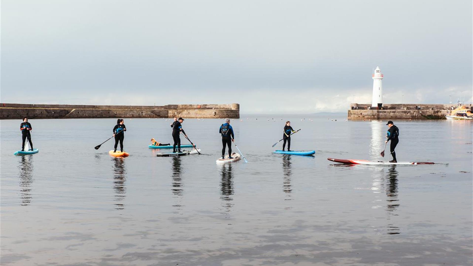 Stand up Paddleboarders in Donaghadee Harbour