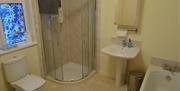 Bathroom with shower, bath, sink and toilet