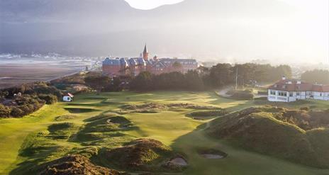 Image showing Royal County Down Golf Course and Slieve Donard Resort and Spa, with Slieve Donard mountain in the background.