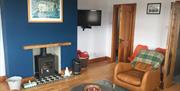 Ballintoy harbour cottage holiday let rent armchairs