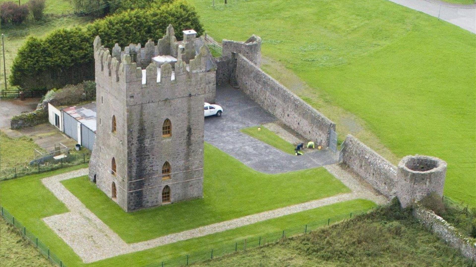 Photo of birds eye view of Kirkistown Castle surrounded by grassland