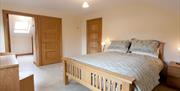 Double bed with bedside lockers
