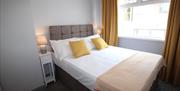 Anjore House serviced apartment bedroom