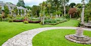 A photograph of the Mount Stewart formal gardens to back of Estate house in bloom