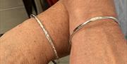Sterling Silver Textured Bangles on Wrists