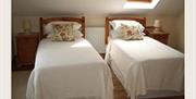 Image of two single beds