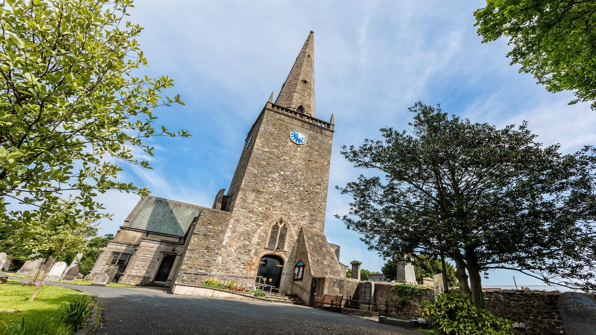 Image of the front of Bangor Abbey on a bright sunny day