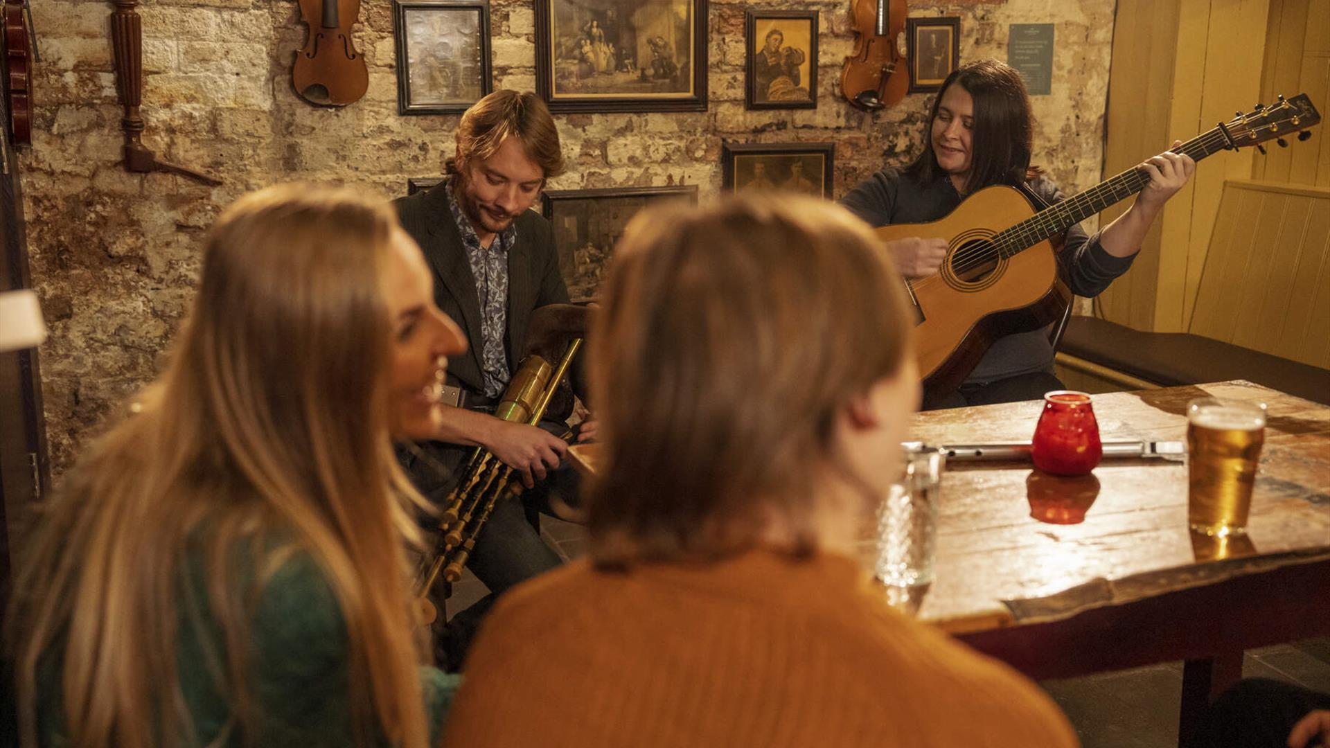Belfast Traditional Music Trail entertain a group