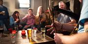 Traditional Irish music is played on the Belfast Trad Trail experience