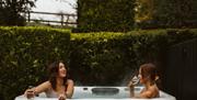 Private outdoor hot tub at Charles Lanyon Lodge, Galgorm