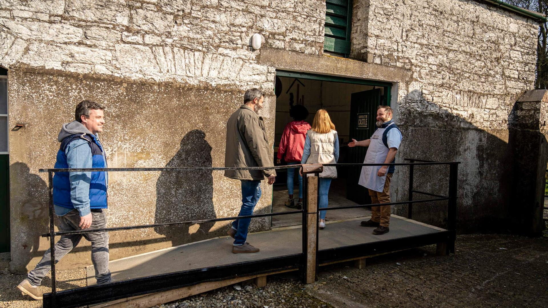Group are welcomed by Sam at the Carved at the Castle experience in Glenarm. Group are welcomed by Sam at the Carved at the Castle experience in Glenarm.