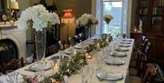 The dining table set for an event