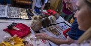 Guests examine Down GAA historical artefacts as part of the Gaelic Games and Craic experience