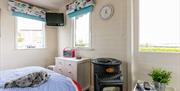 Double bed located in Seal Cabin with views out towards Strangford Lough.