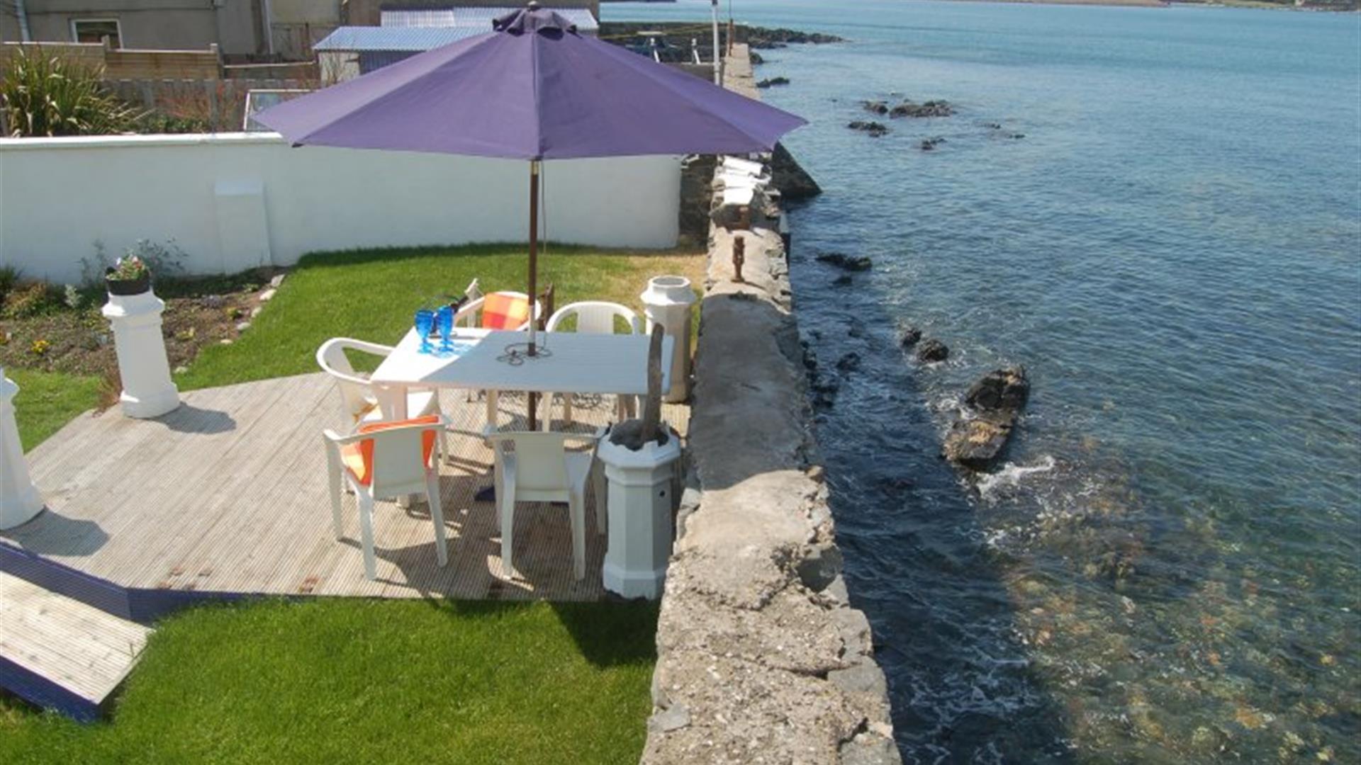 Decking and seating area by the sea