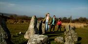 Visitors enjoy the stone circles at Beaghmore, which sits within an Area of Outstanding Natural Beauty