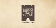 Logo showing tower shape with words Carrick's Hidden Tower House - Dobbins Inn