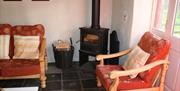 Sofas and wood-burning stove