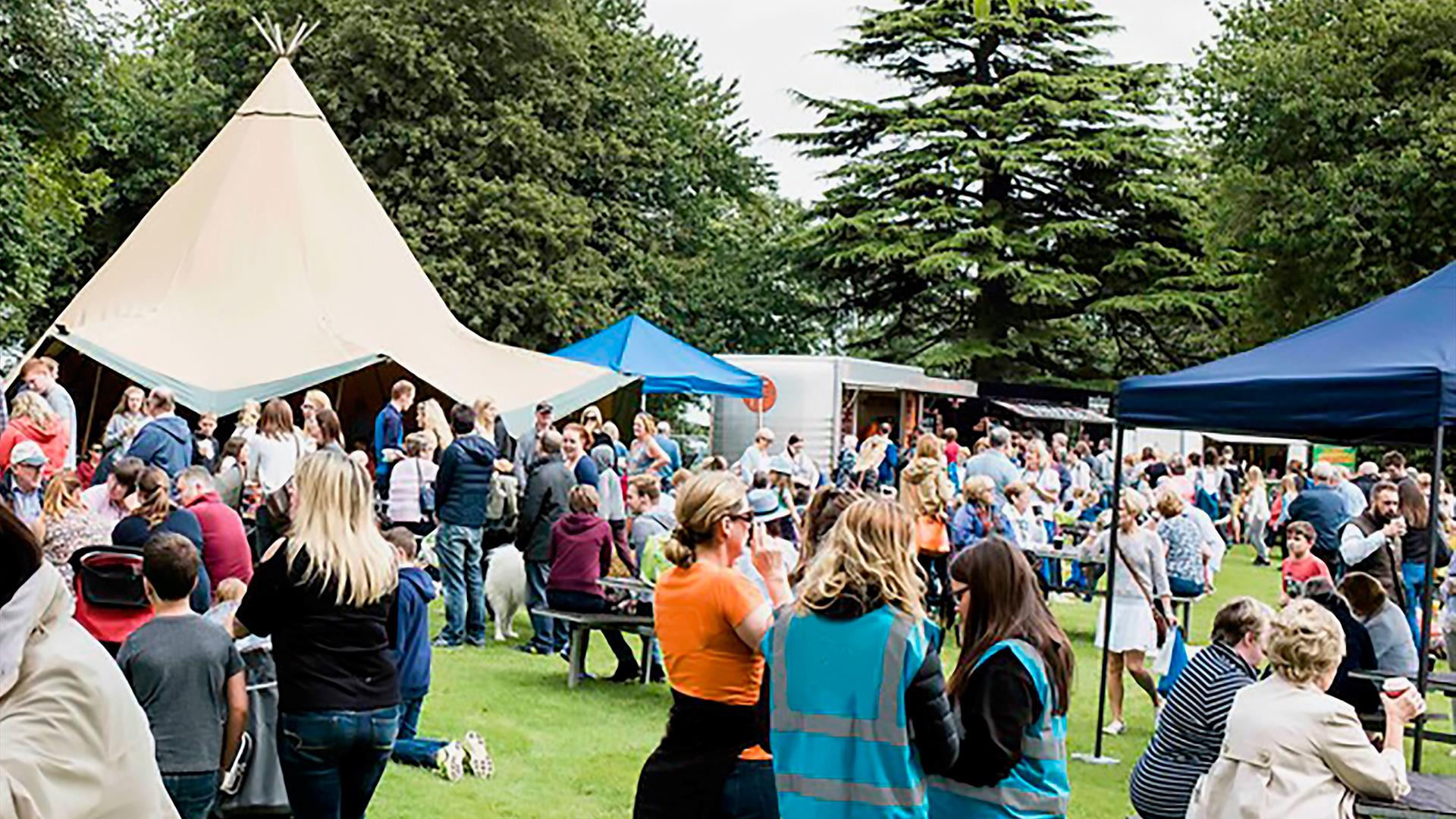 Image shows visitors enjoying food and drink at the Moira Speciality Food Fair