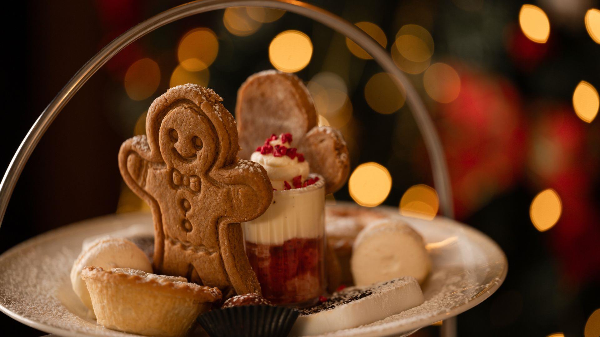 Plate with gingerbread person, mince pies and mini trifle Plate with gingerbread person, mince pies and mini trifle