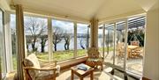 View of a sunroom at Shamrock Cottage, which overlooks Lough Erne, Co. Fermanagh, Northern Ireland.