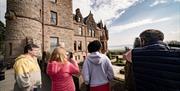 Group at Belfast Castle enjoying the Cavehill Walking Tour with Experience and Explore