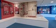 Exhibition room with some display information and maps