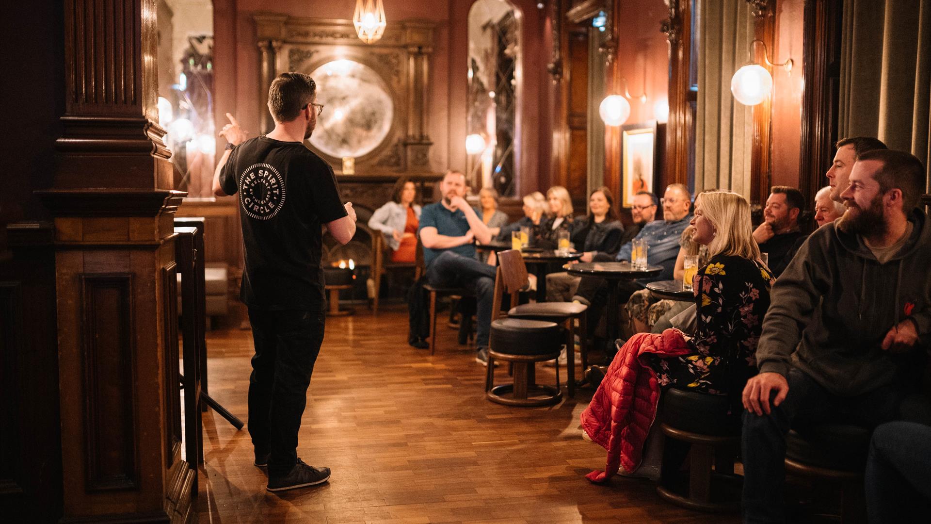 The Spirit Circle host welcoming a room full of guests to Belfast By The Glass Experience The Spirit Circle host welcoming a room full of guests to Belfast By The Glass Experience