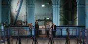 Group enjoys a tour of the historic pumphouse, part of Titanic Distillery
