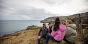 Tour group takes in the views of a filming location from Game of Thrones