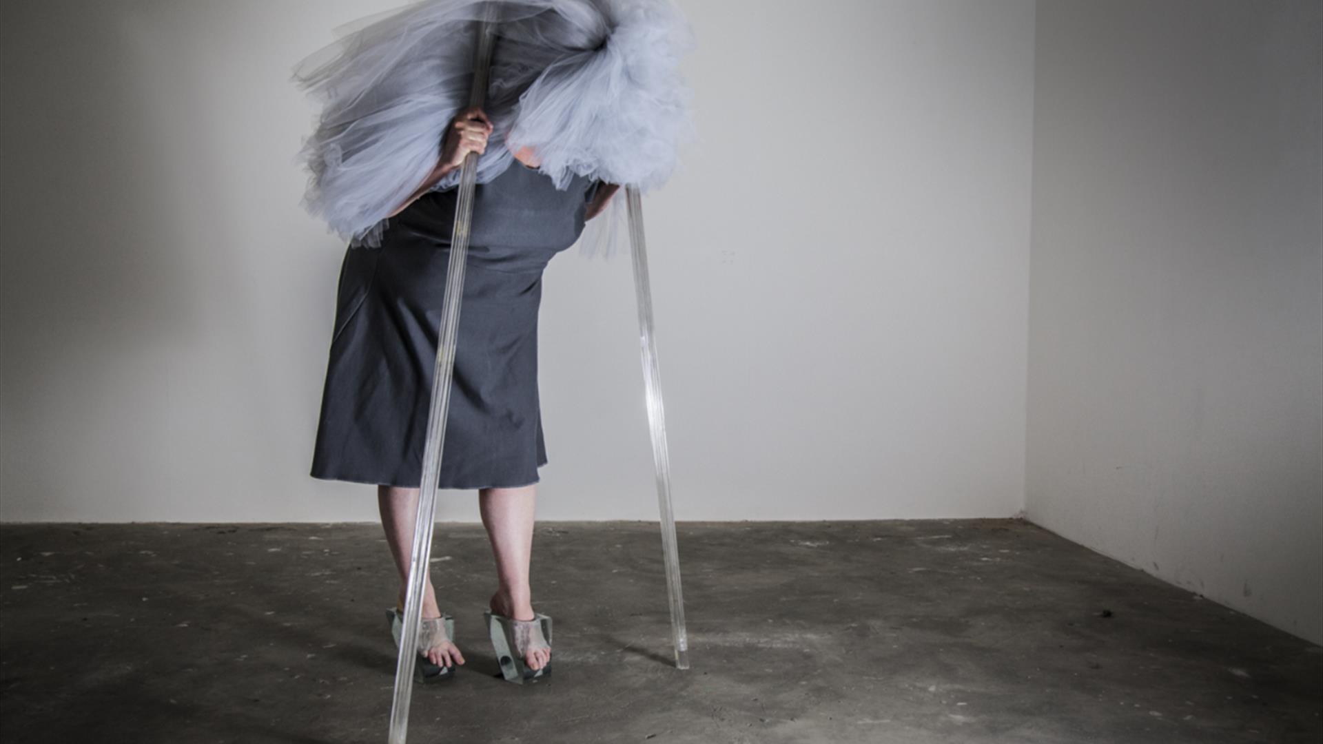 Image from the video work '35 I can'ts'  showing performance artist Jayne Cherry. Alison Lowry wanted to examine the story of Cinderella's glass shoes