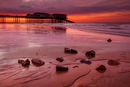 View of Cromer Pier and Beach at sunset