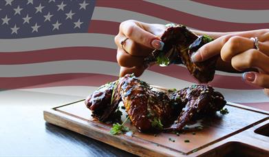 American Night Chicken Wings with American Flag in the background.