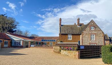 Caley Hall Hotel main building with blue sky