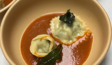 Fresh pasta in rich tomato sauce