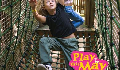 Boy climbing at bewilderwood